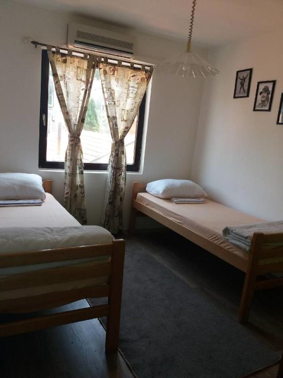 Postel nebo postele na pokoji v ubytování Balkaneros Hostel