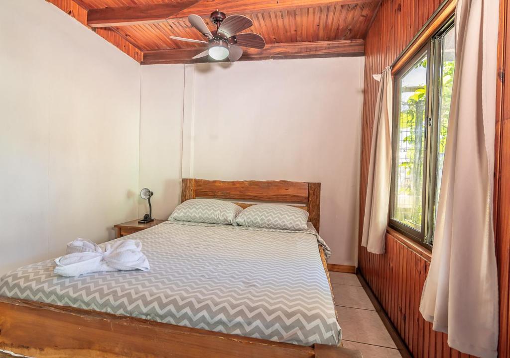 Postel nebo postele na pokoji v ubytování Cabinas Arrecife