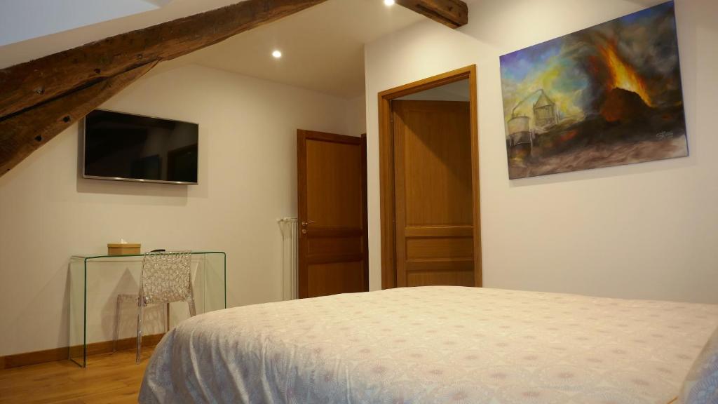 Postel nebo postele na pokoji v ubytování B&B Château de Preuil