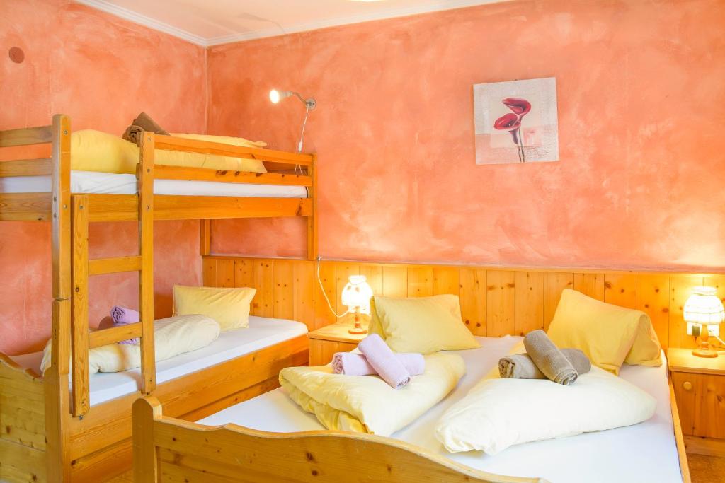 Posteľ alebo postele v izbe v ubytovaní Hotel Gell