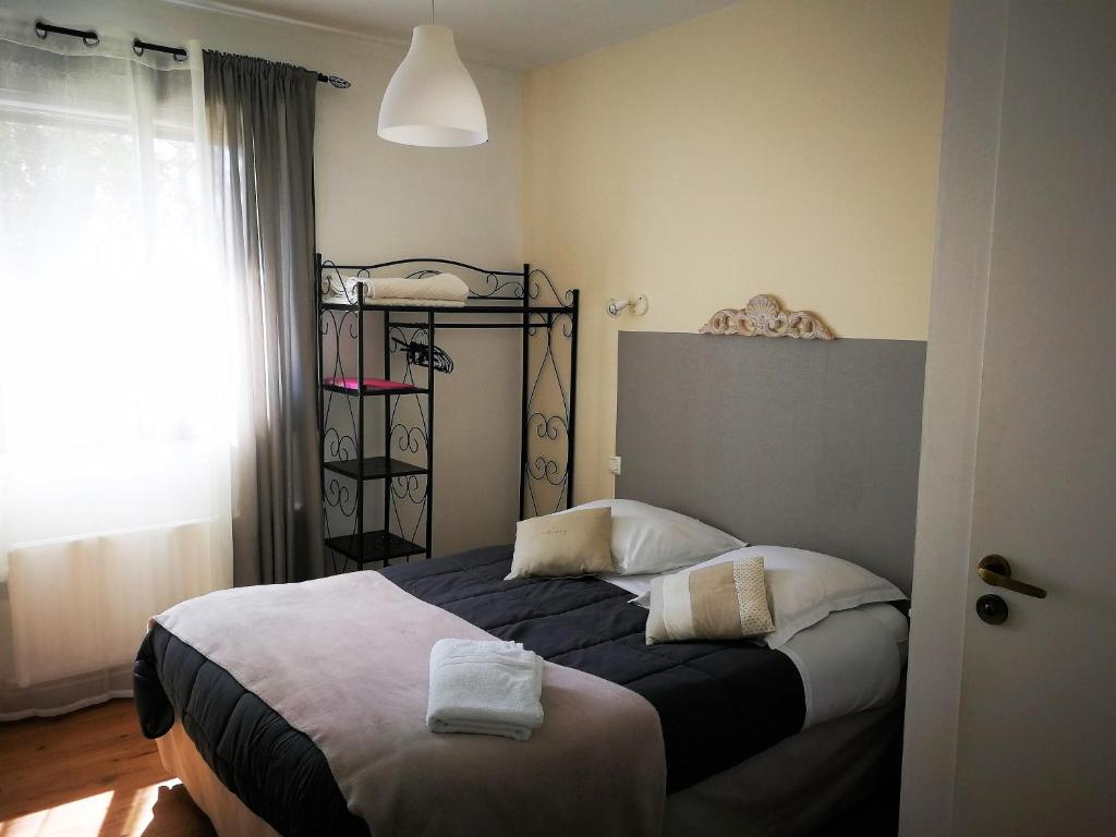 Postel nebo postele na pokoji v ubytování Terrasses de l'Aven