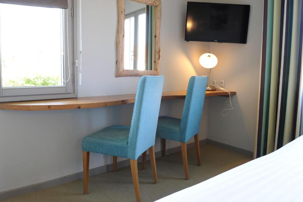 TV a/nebo společenská místnost v ubytování Hotel & Appartements Gochoki