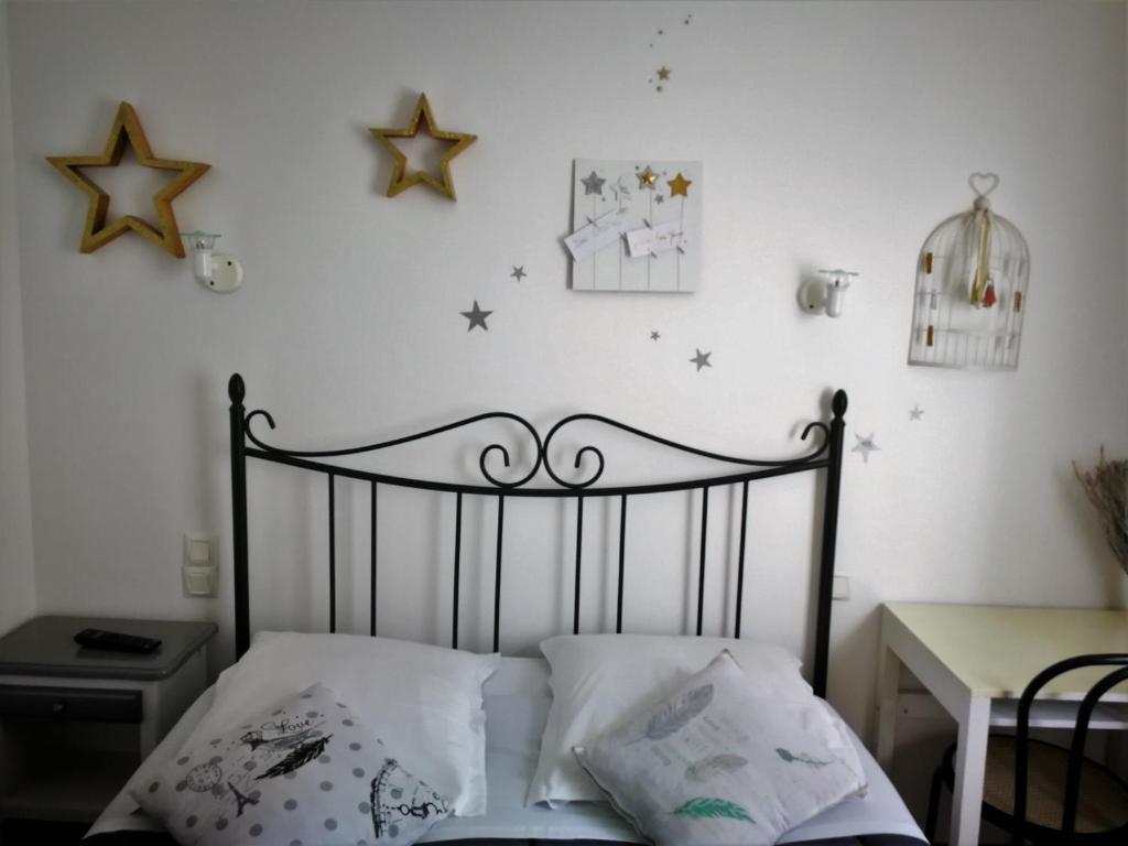 Postel nebo postele na pokoji v ubytování Terrasses de l'Aven