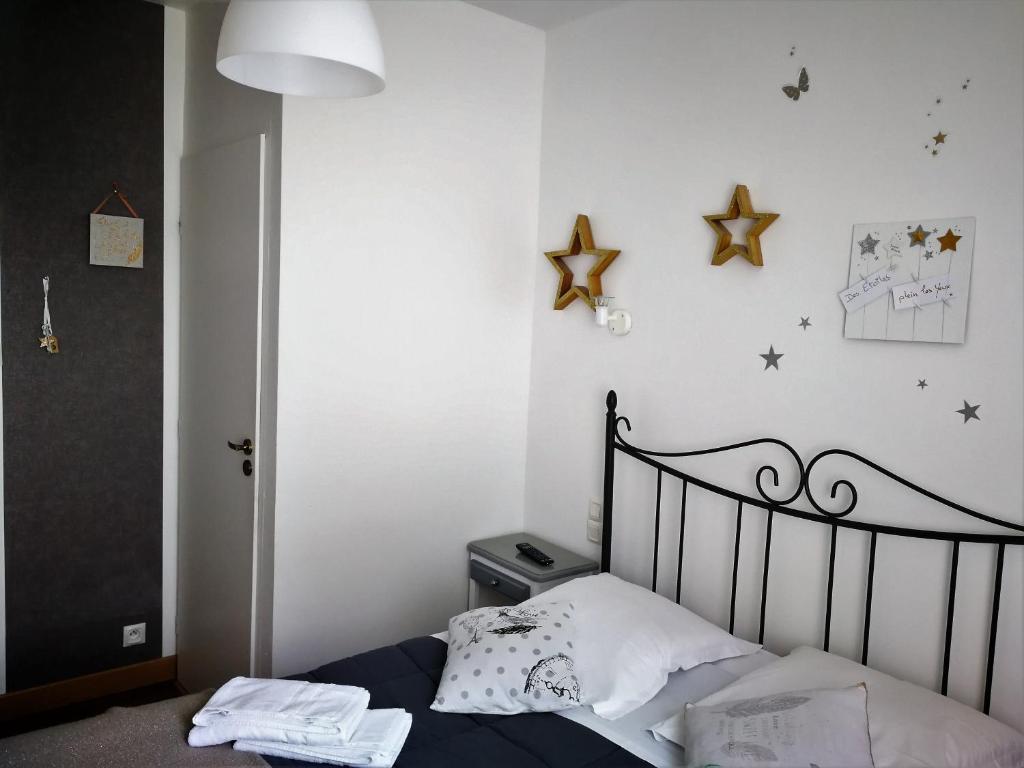 Postel nebo postele na pokoji v ubytování Terrasses de l'Aven