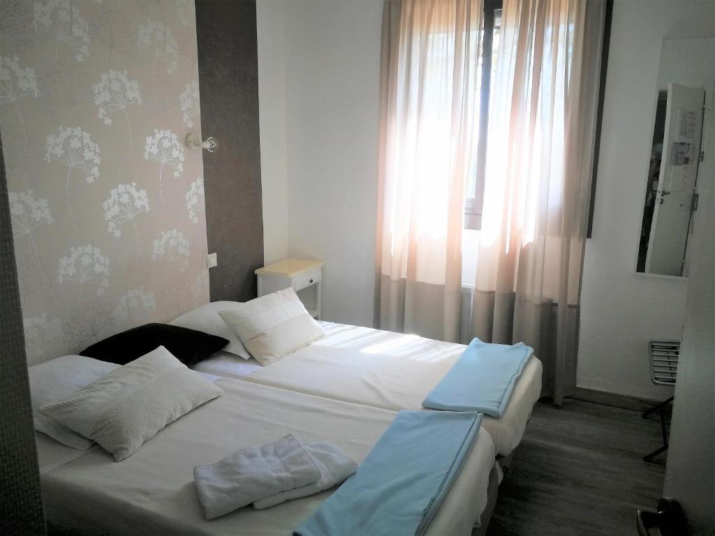 Postel nebo postele na pokoji v ubytování Terrasses de l'Aven