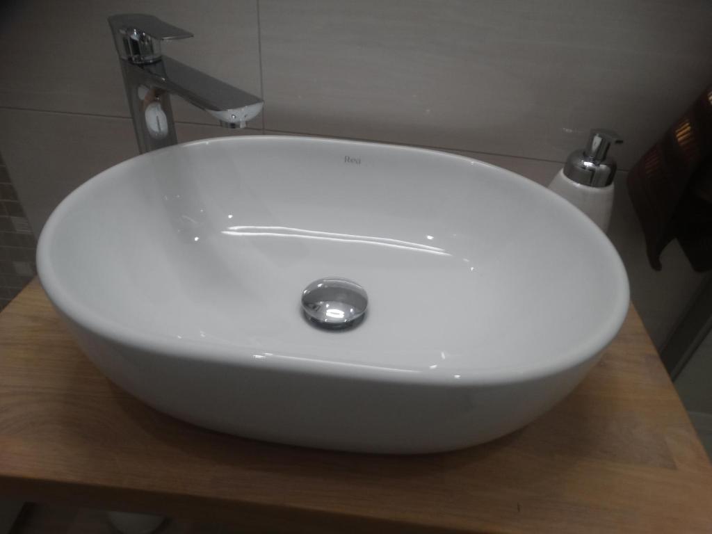 Kúpeľňa v ubytovaní Apartament Bursztynowy