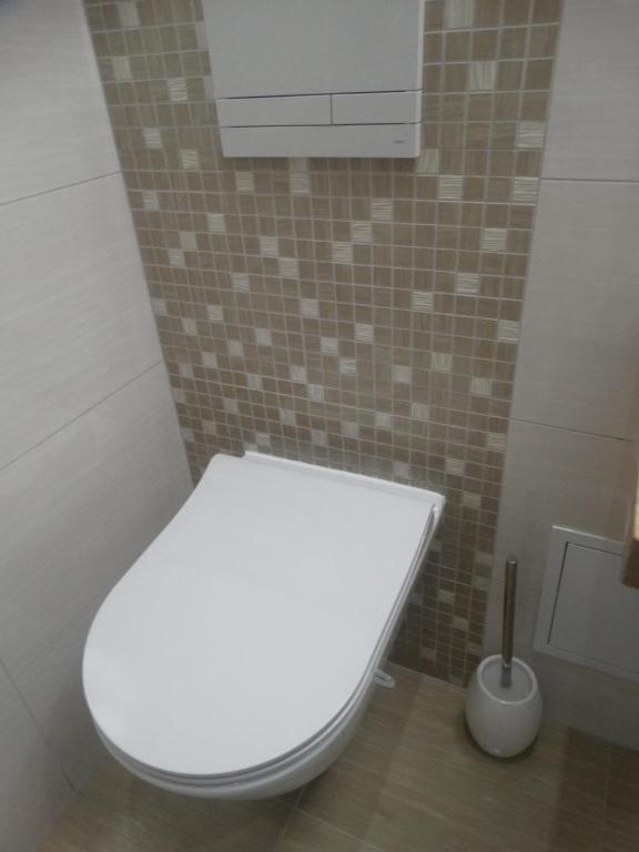 Kúpeľňa v ubytovaní Apartament Bursztynowy