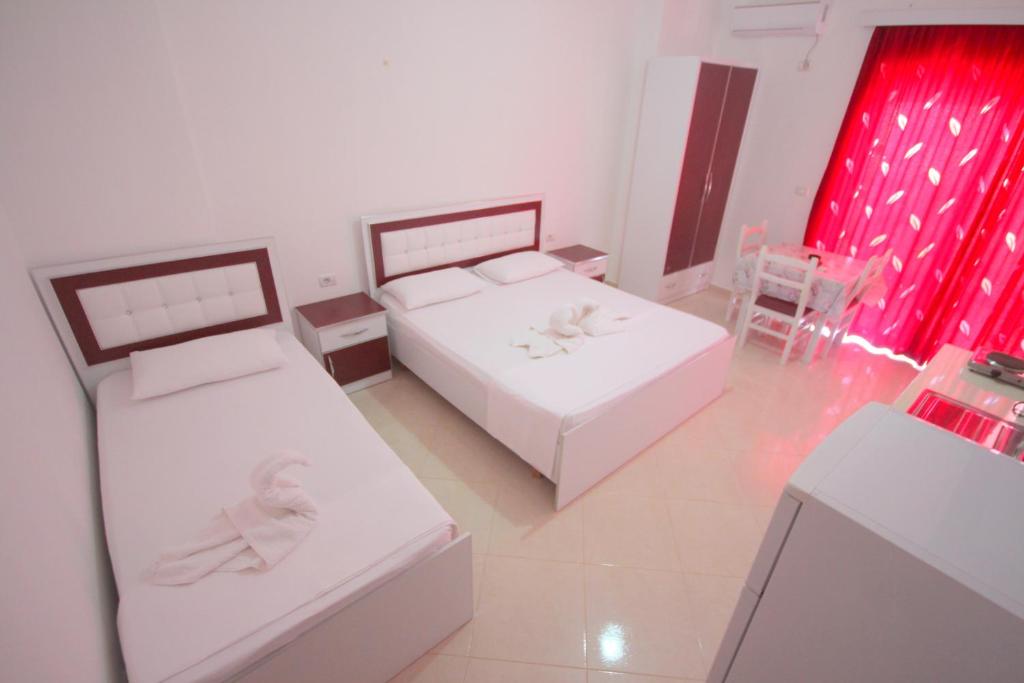 Postel nebo postele na pokoji v ubytování Hotel Four Islands