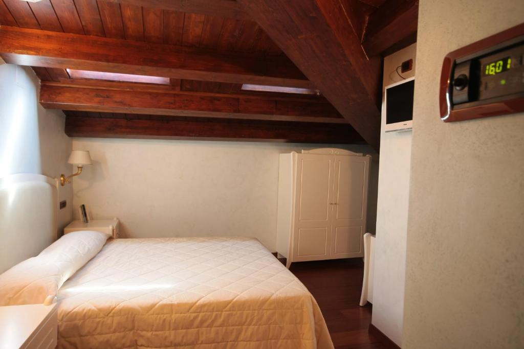 Postel nebo postele na pokoji v ubytování Hotel Rojan
