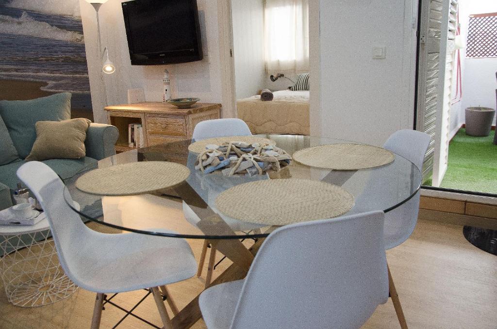 Televízia a/alebo spoločenská miestnosť v ubytovaní Oscar Apartment Sol