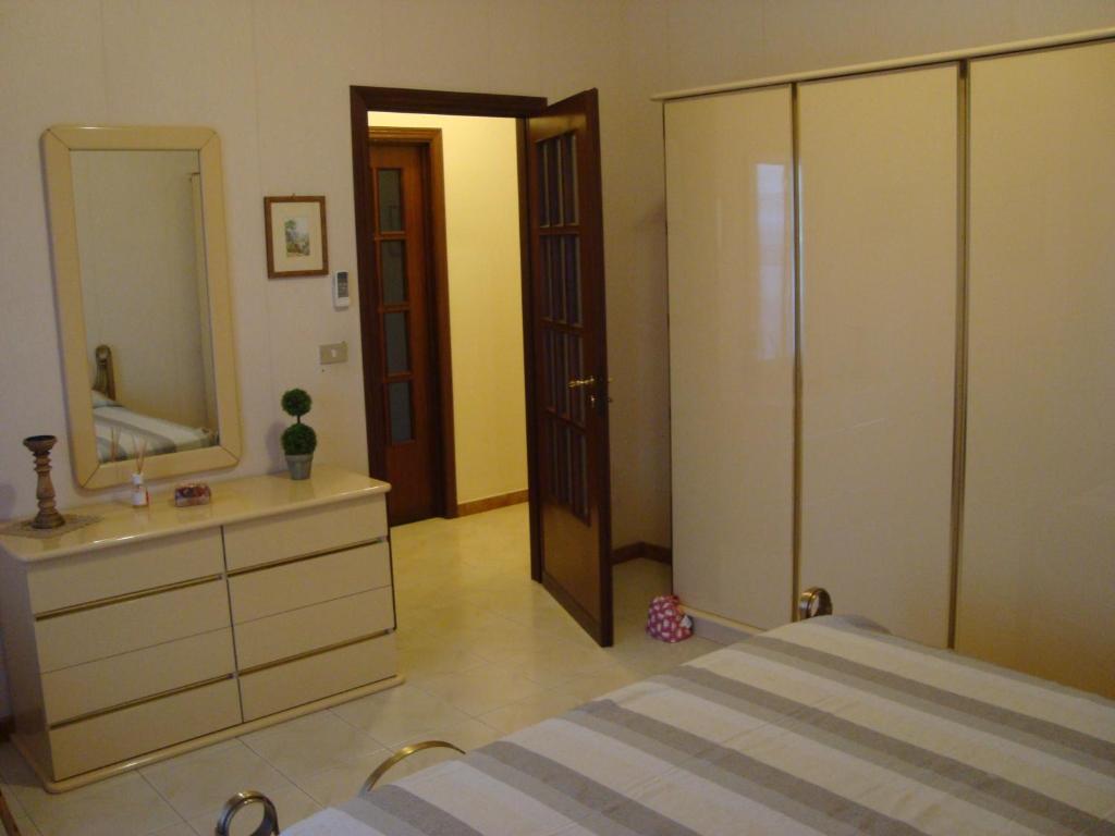 Postel nebo postele na pokoji v ubytování Casa delle Pomelie - Taormina & Etna Panoramic Views