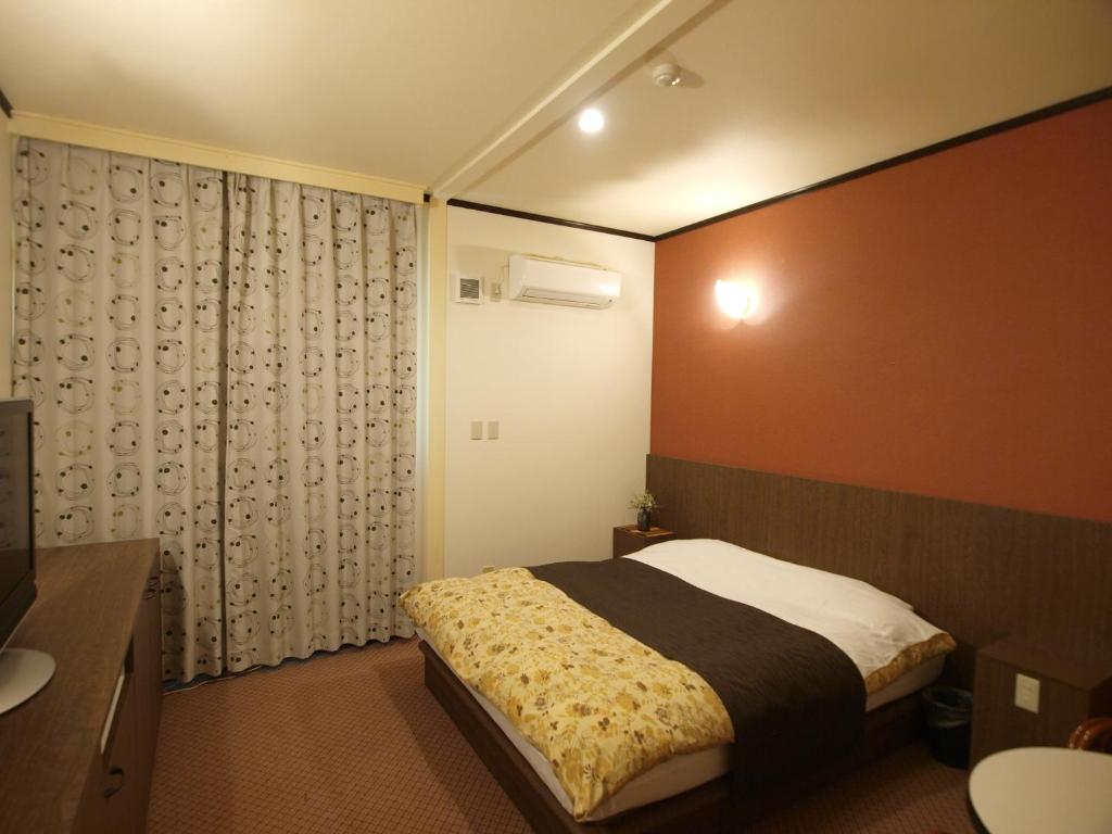 Postel nebo postele na pokoji v ubytování Hotel Le Mont (Adult Only)