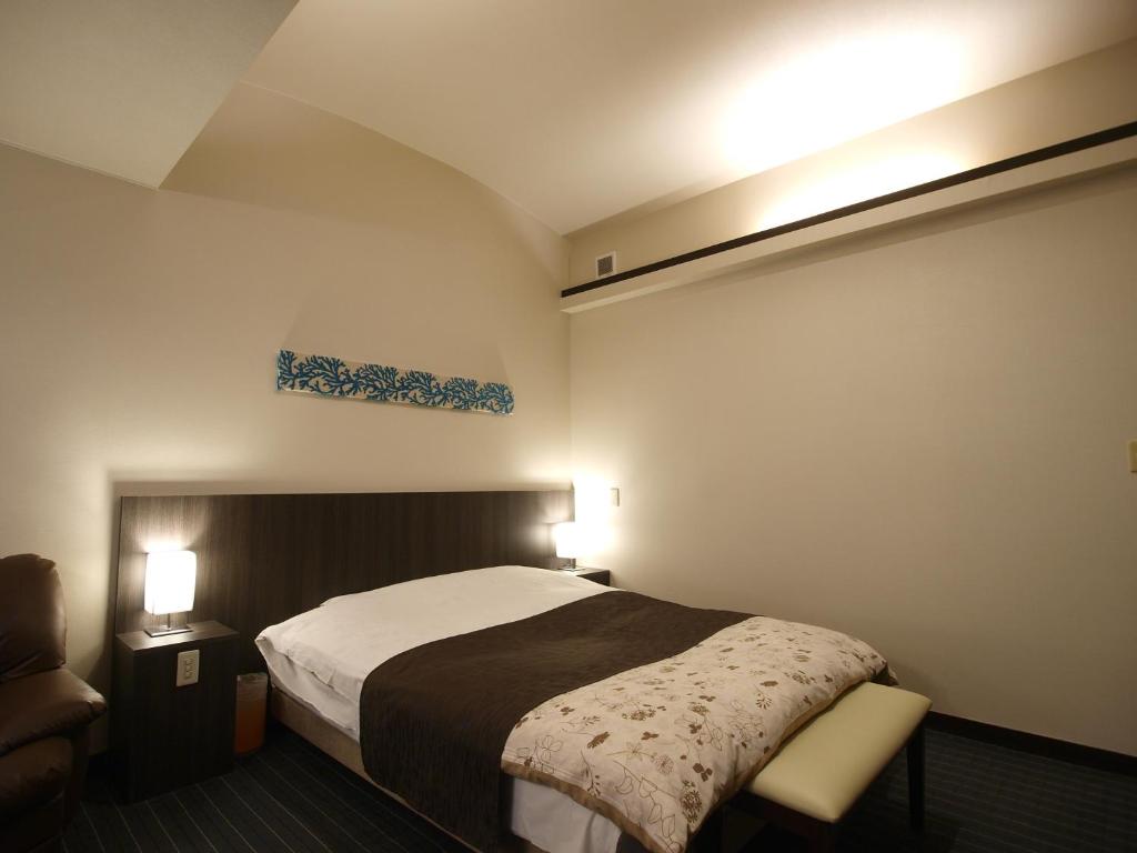 Postel nebo postele na pokoji v ubytování Hotel Le Mont (Adult Only)