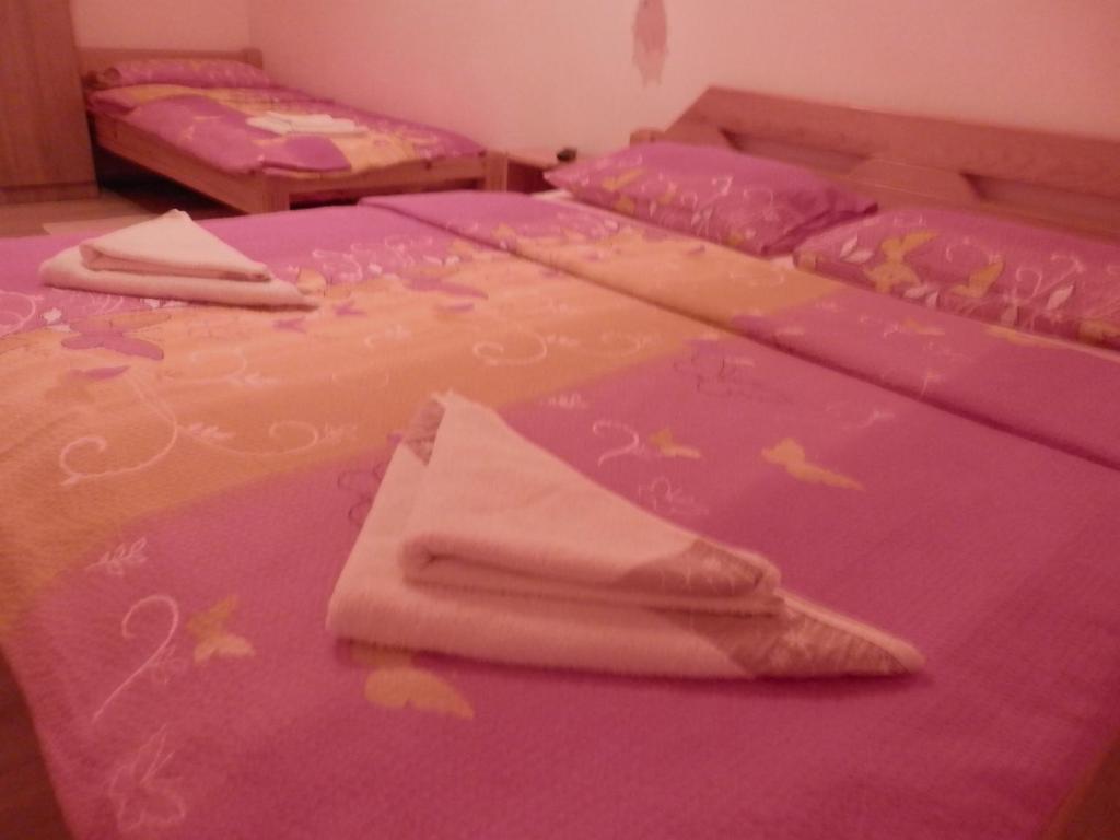 Postel nebo postele na pokoji v ubytování Guesthouse Matija