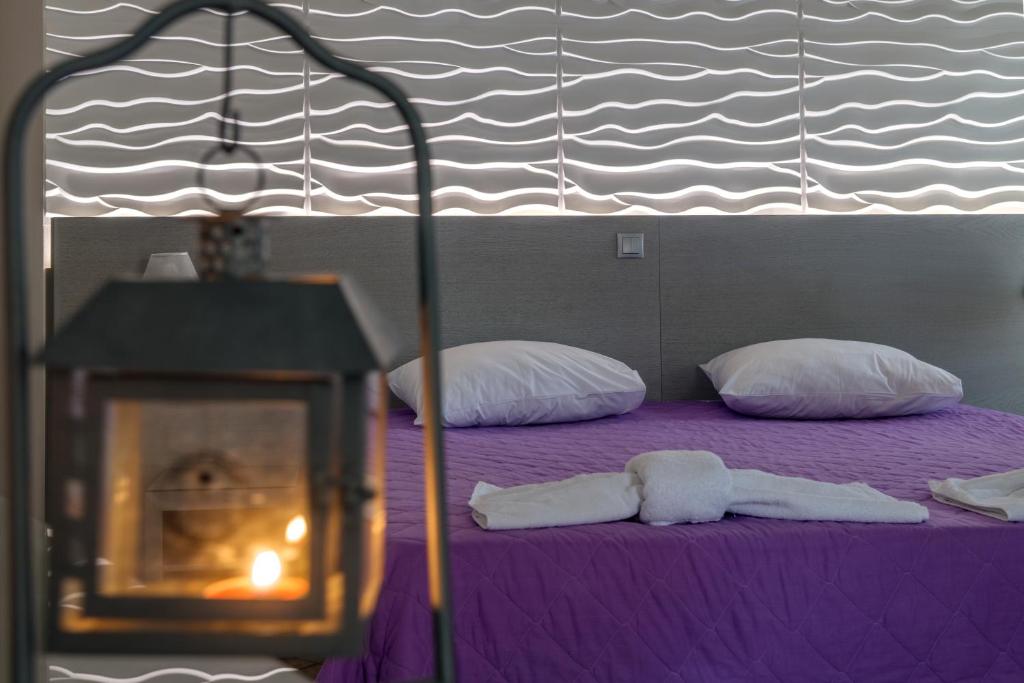 Postel nebo postele na pokoji v ubytování Ethrion