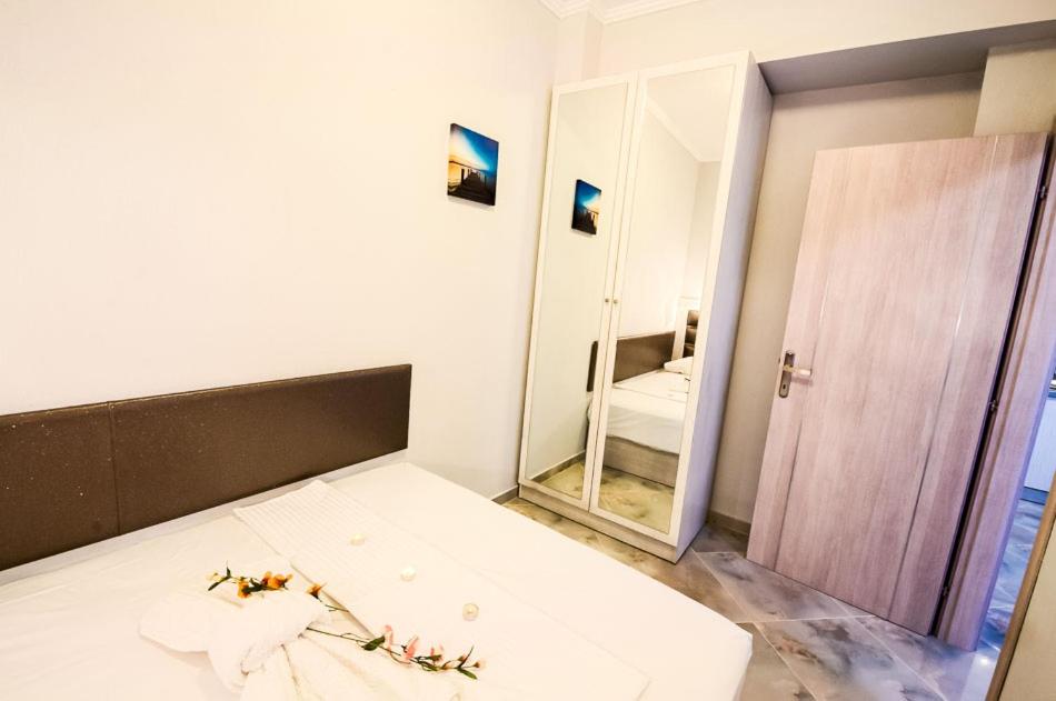 Łóżko lub łóżka w pokoju w obiekcie Villa Kaiti