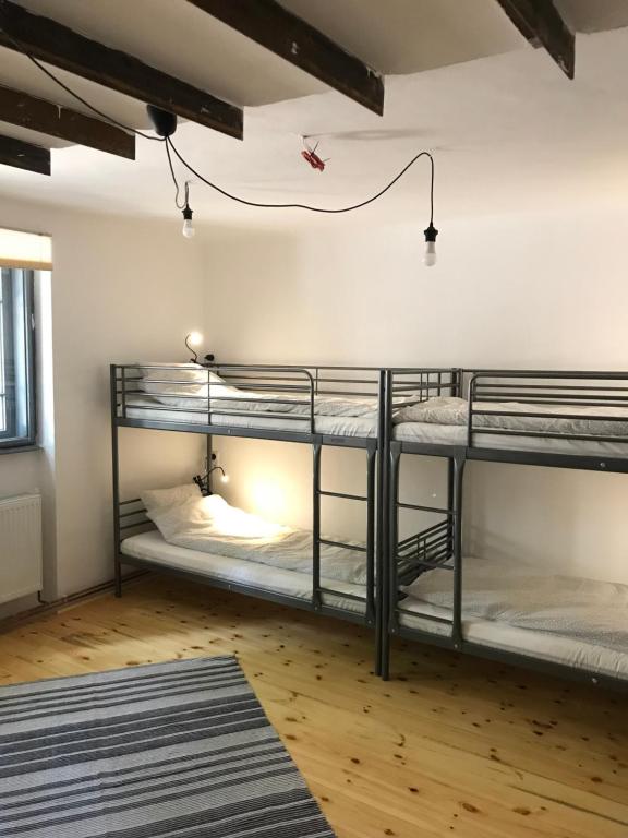 Postel nebo postele na pokoji v ubytování Passpartout Hostel
