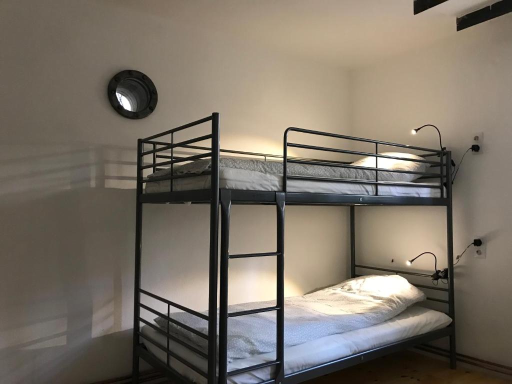 Postel nebo postele na pokoji v ubytování Passpartout Hostel
