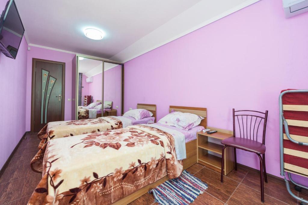 Postel nebo postele na pokoji v ubytování Villa Orchidea