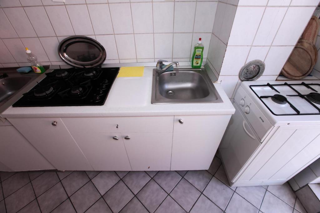 Kuchyňa alebo kuchynka v ubytovaní Apartments Adna