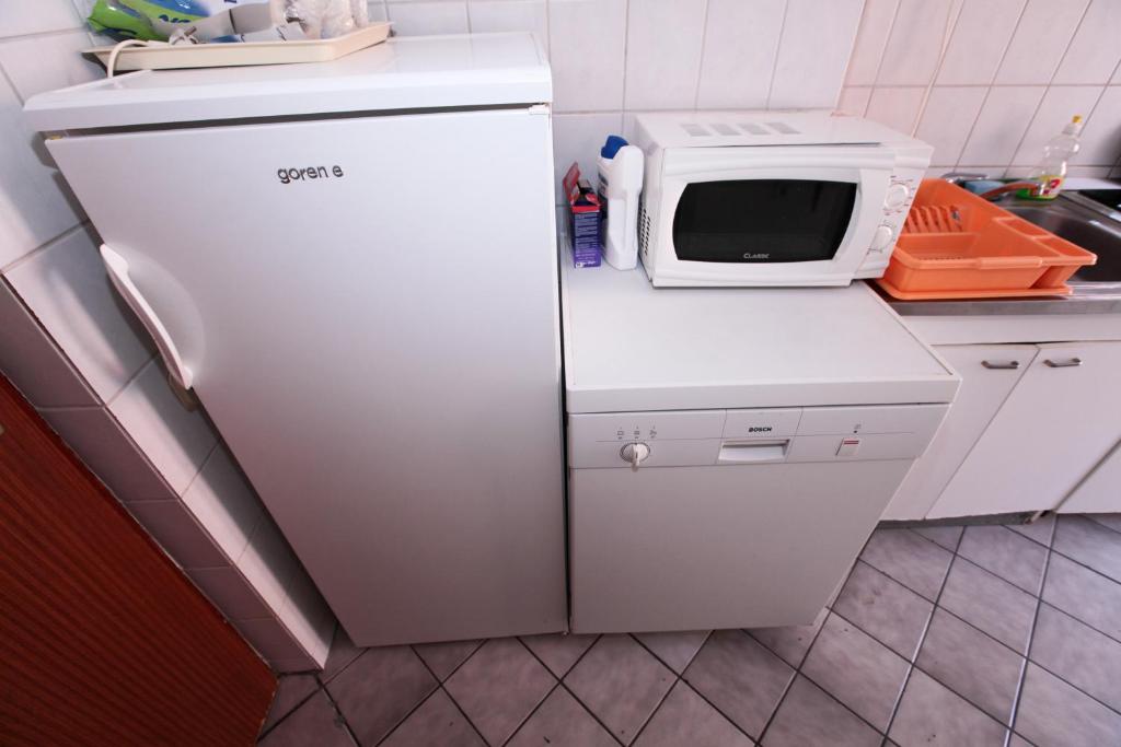 Kuchyňa alebo kuchynka v ubytovaní Apartments Adna