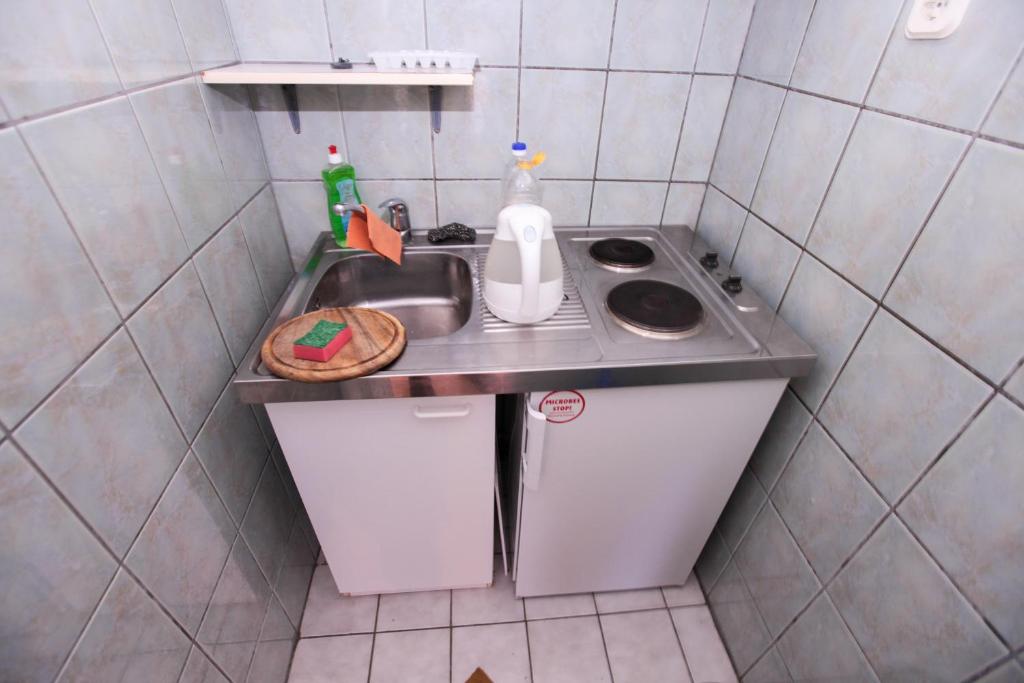 Kuchyňa alebo kuchynka v ubytovaní Apartments Adna