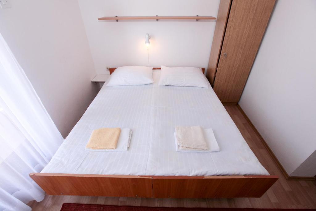 Posteľ alebo postele v izbe v ubytovaní Apartments Adna