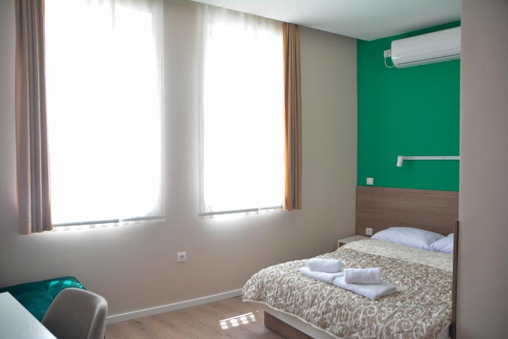 Postel nebo postele na pokoji v ubytování Vila Nova