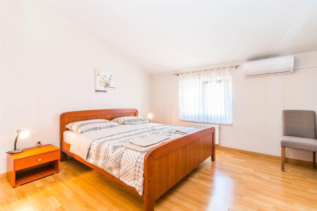 Postel nebo postele na pokoji v ubytování Apartment Salha