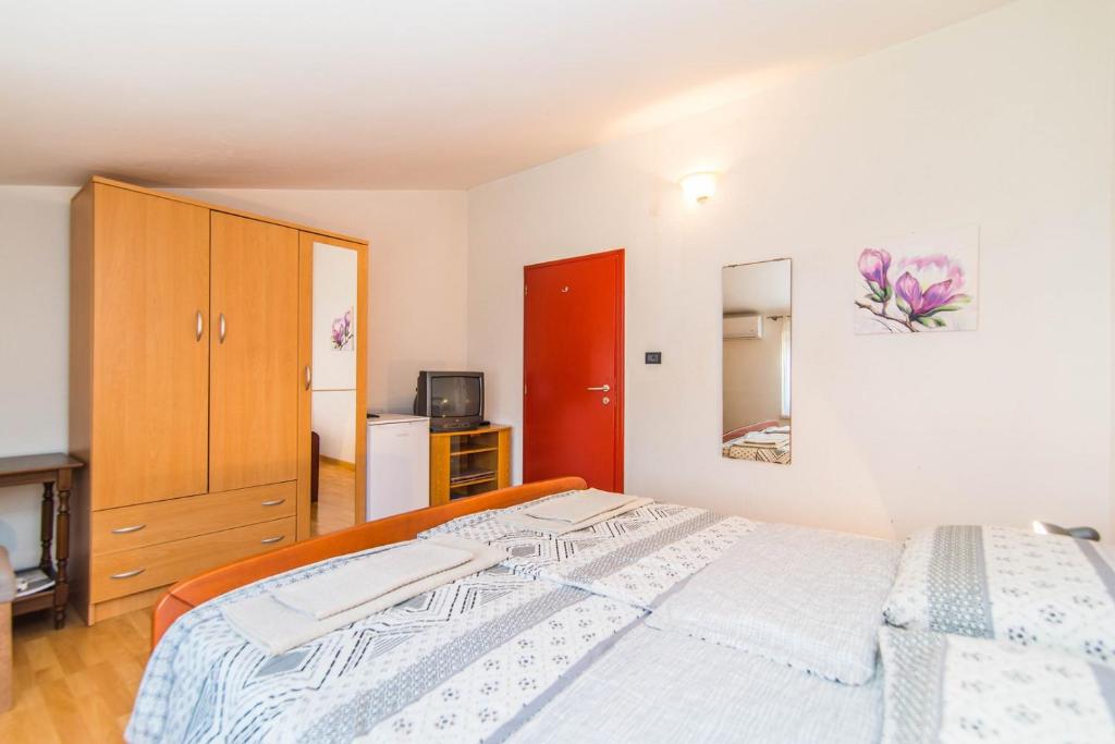 Postel nebo postele na pokoji v ubytování Apartment Salha