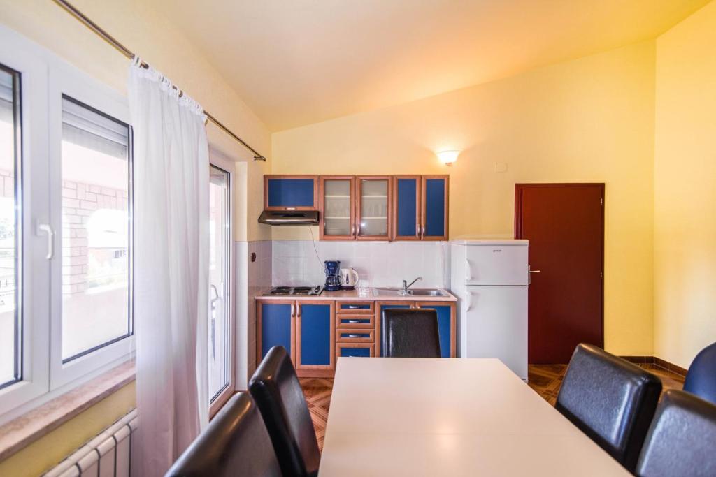 Kuchyň nebo kuchyňský kout v ubytování Apartment Salha