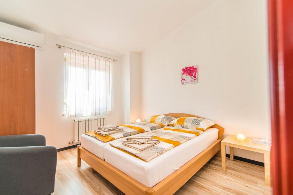 Postel nebo postele na pokoji v ubytování Apartment Salha