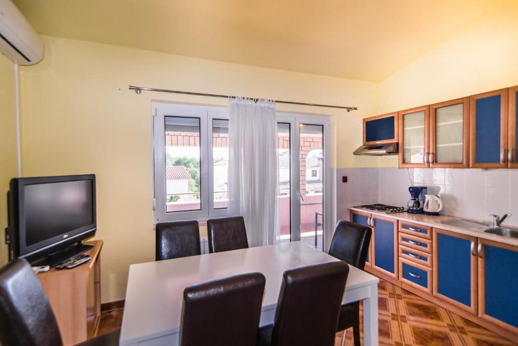 Kuchyň nebo kuchyňský kout v ubytování Apartment Salha