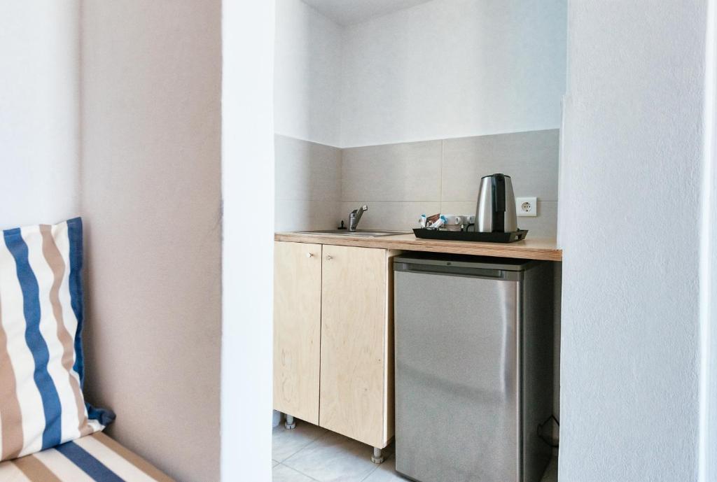 Kuchyň nebo kuchyňský kout v ubytování Elounda Krini Hotel