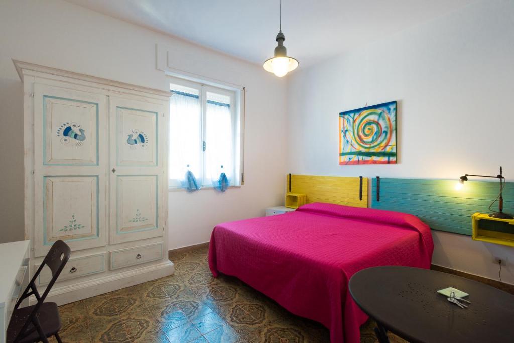 Postel nebo postele na pokoji v ubytování B&B BentueMari
