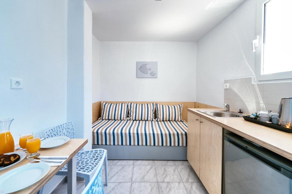 Kuchyň nebo kuchyňský kout v ubytování Elounda Krini Hotel