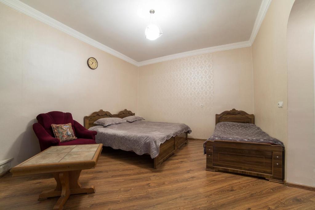 Postel nebo postele na pokoji v ubytování Guest House Khatuna
