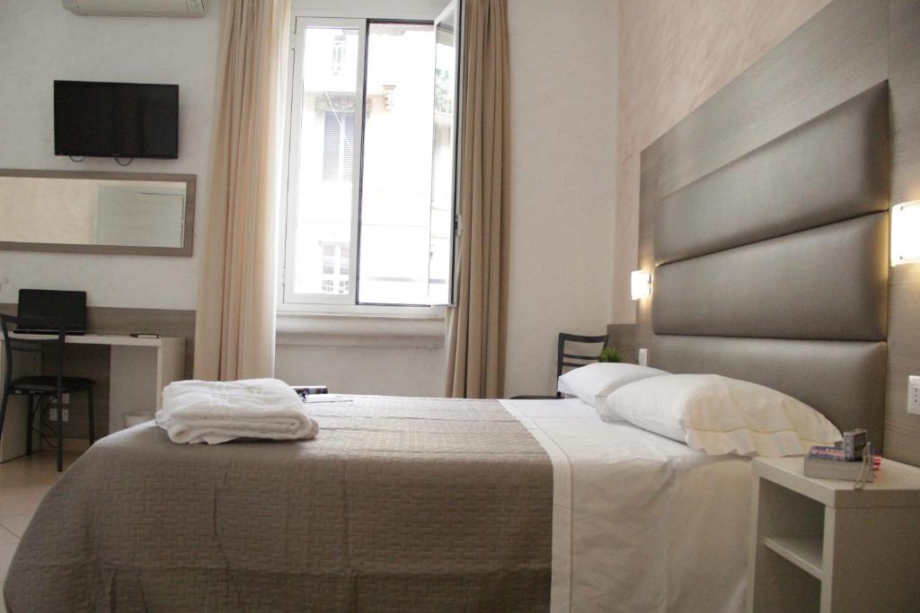 Postel nebo postele na pokoji v ubytování Hotel Siro