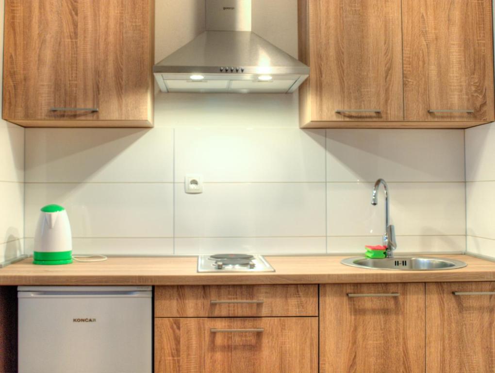 Kuchyňa alebo kuchynka v ubytovaní Apartmani Matko