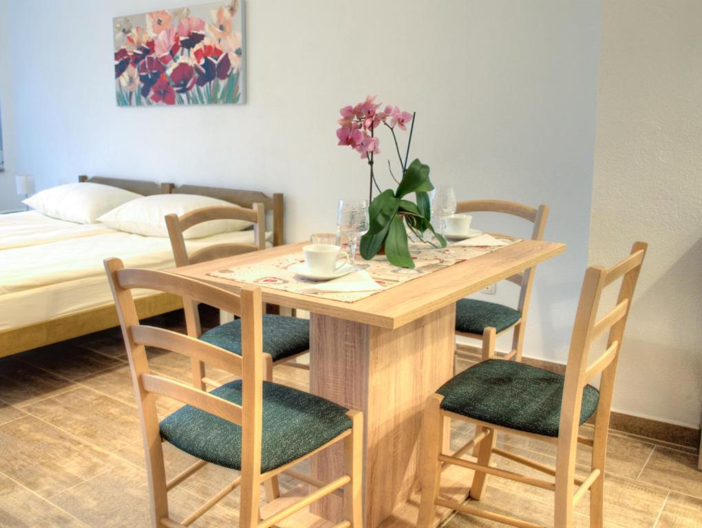 Posteľ alebo postele v izbe v ubytovaní Apartmani Matko