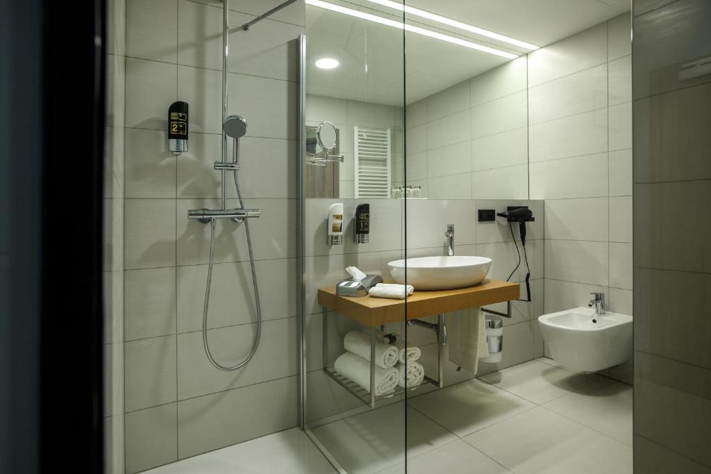 Koupelna v ubytování Hotel Rajka
