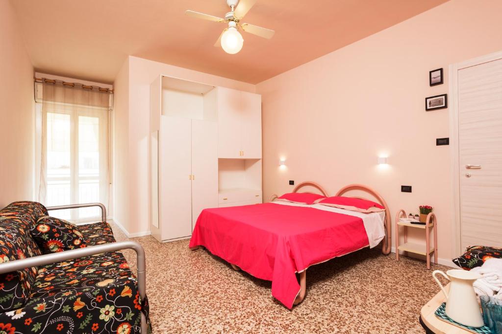 Postel nebo postele na pokoji v ubytování Hotel Paris