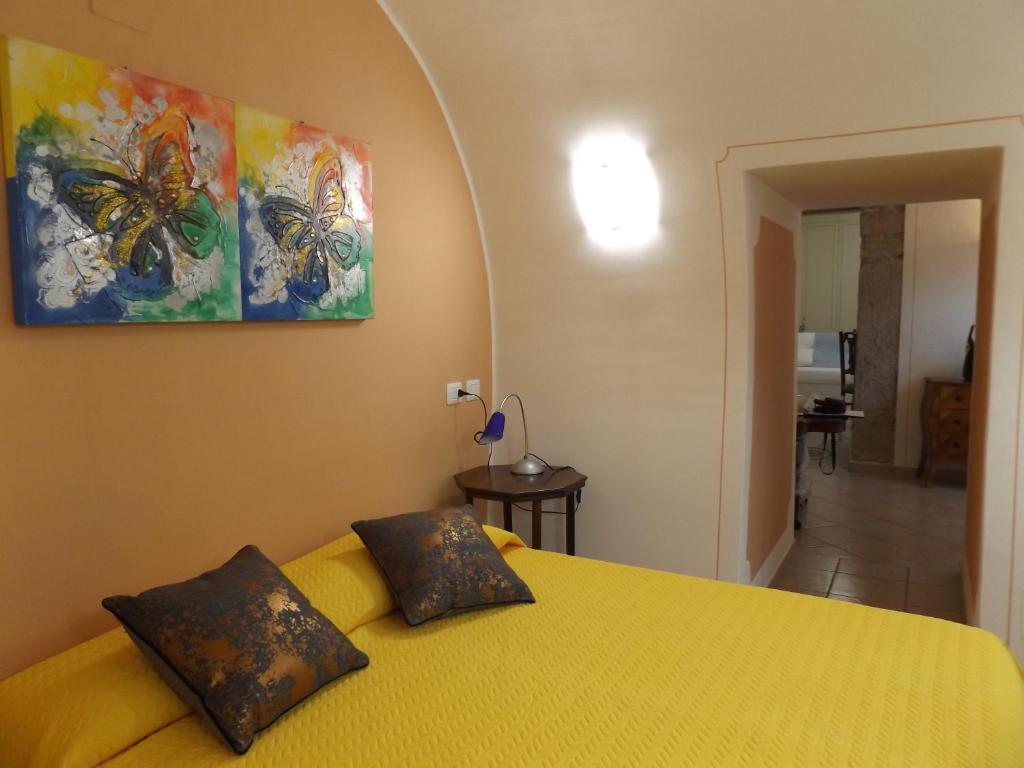 Postel nebo postele na pokoji v ubytování Casa Portici
