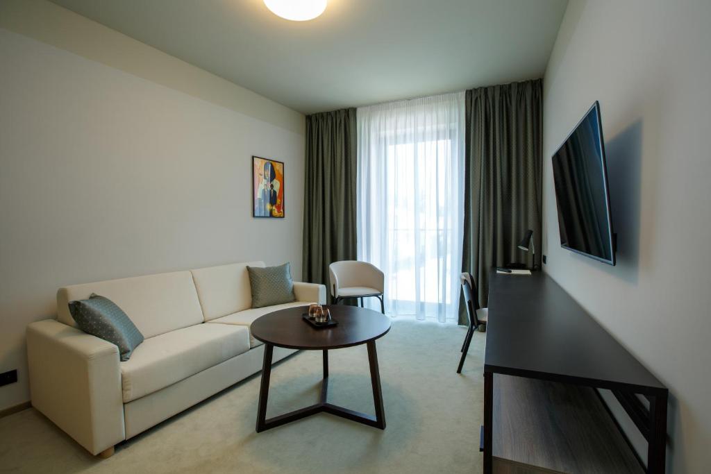 TV a/nebo společenská místnost v ubytování Hotel Rajka