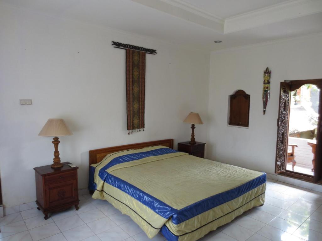 Postel nebo postele na pokoji v ubytování Nuriani Guest House