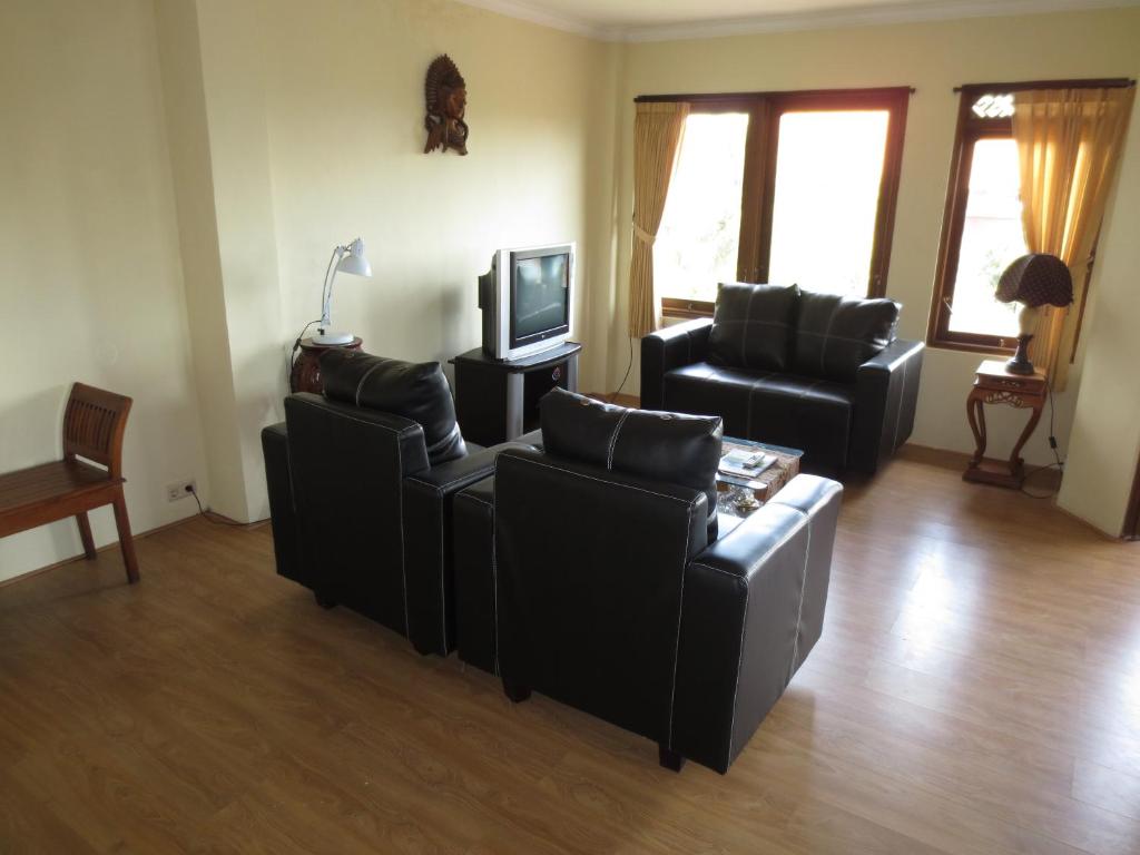 TV a/nebo společenská místnost v ubytování Nuriani Guest House