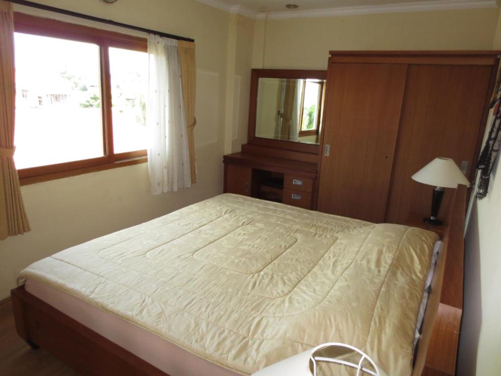 Postel nebo postele na pokoji v ubytování Nuriani Guest House