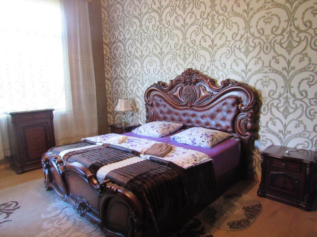 Postel nebo postele na pokoji v ubytování Guest House Levan II Dadiani