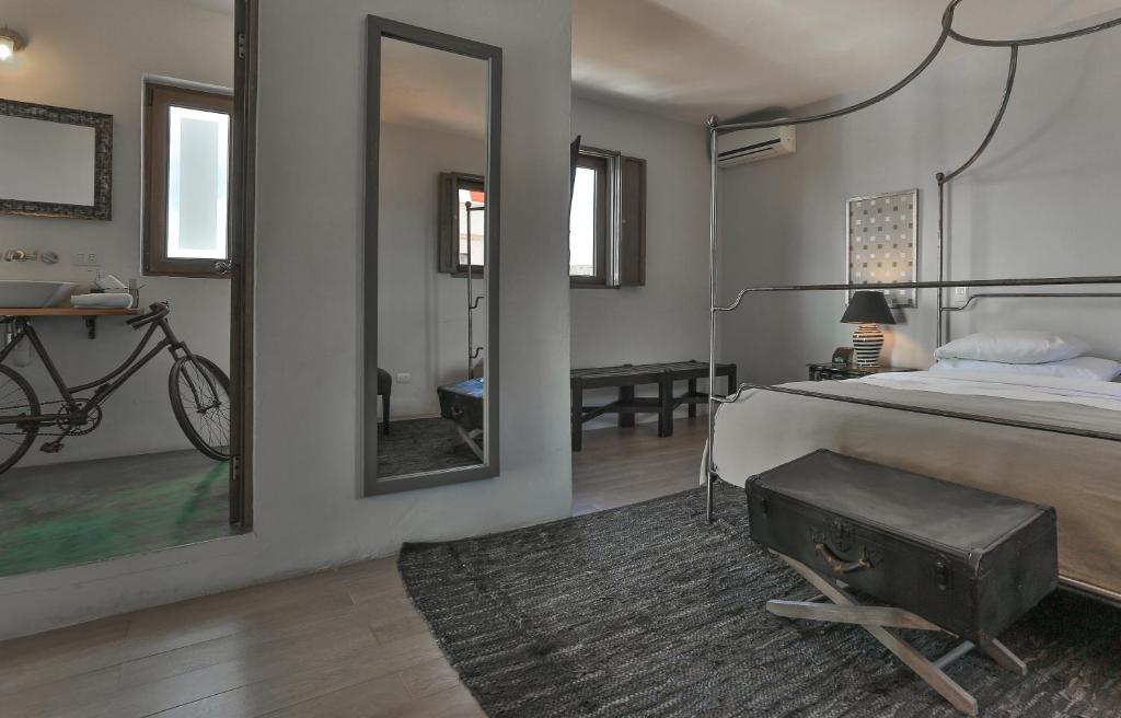 Postel nebo postele na pokoji v ubytování Hotel Boutique El Palomar