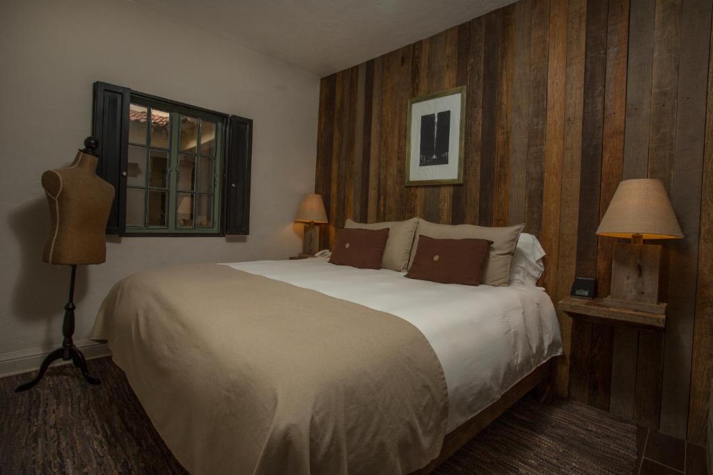 Postel nebo postele na pokoji v ubytování Hotel Boutique El Palomar